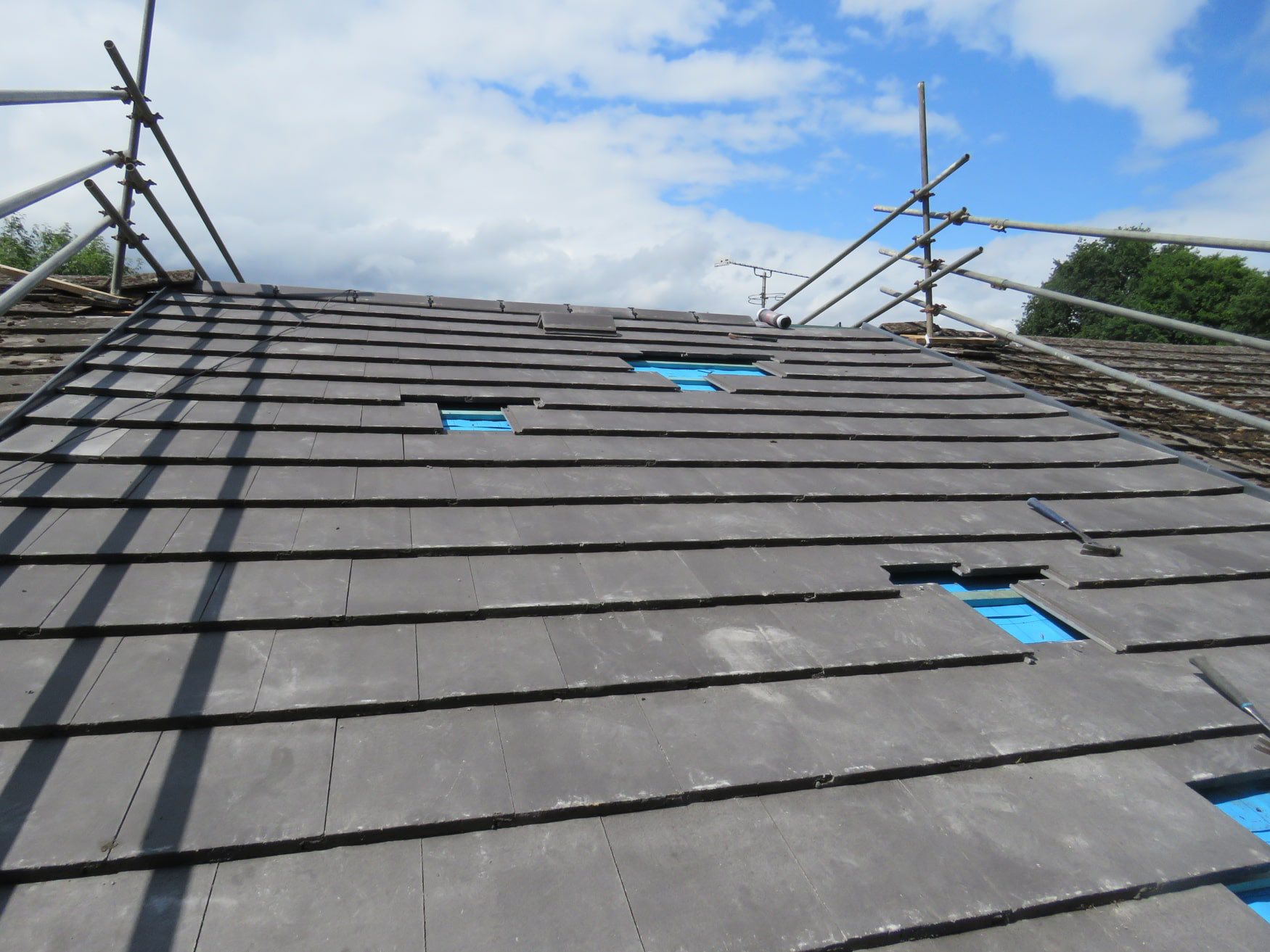 Natural slate roof repair in Honiton