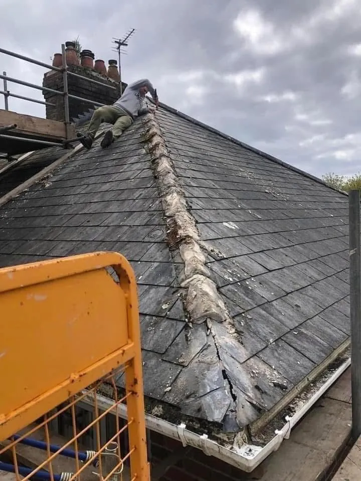 Slate roof ridge and chimney repair in Honiton